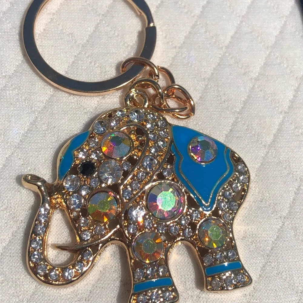Beautiful lightweight sparkly elephant keychain 💙🐘🤍 - Picture 2 of 7